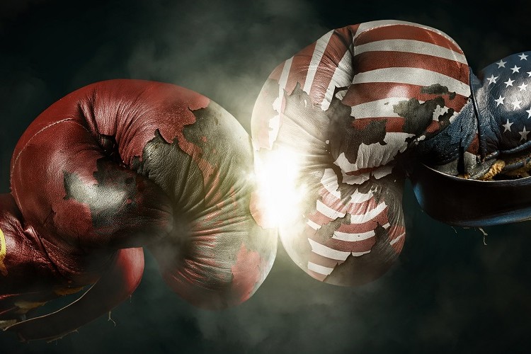 A soviet boxing glove clashing with a U.S.A boxing glove.