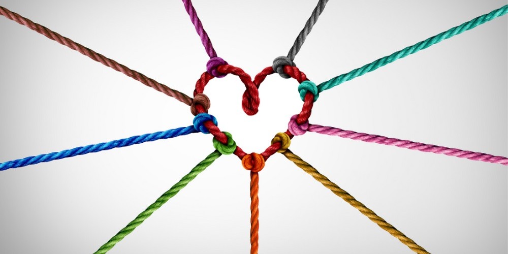 Multi-colored ropes joining together in a heart